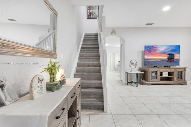 14063 SW 49th Ct Unit 4, Miramar, FL 33027 - stairs featuring arched walkways and tile patterned flooring