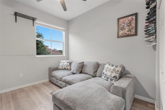 14063 SW 49th Ct Unit 4, Miramar, FL 33027 - living room with baseboards, a ceiling fan, and wood finished floors