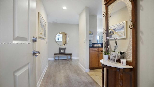 8390 SW 72nd Ave Unit 811, Miami, FL 33143 - hallway with baseboards and light wood-type flooring