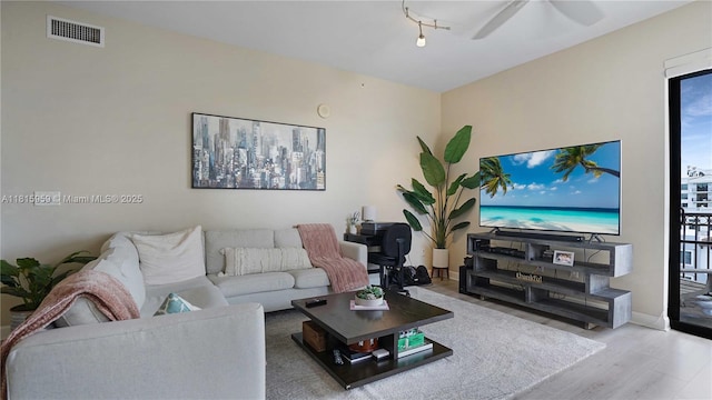 8390 SW 72nd Ave Unit 811, Miami, FL 33143 - living area with wood finished floors and ceiling fan