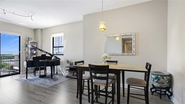 8390 SW 72nd Ave Unit 811, Miami, FL 33143 - dining space featuring wood finished floors and baseboards