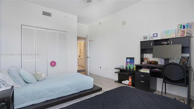 8390 SW 72nd Ave Unit 811, Miami, FL 33143 - bedroom featuring light wood finished floors, a closet, and a desk