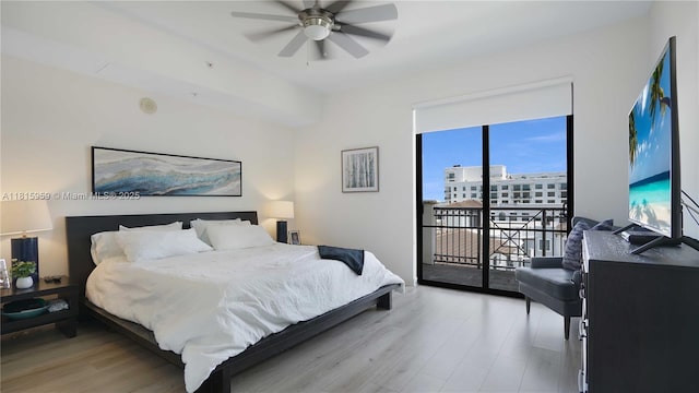 8390 SW 72nd Ave Unit 811, Miami, FL 33143 - bedroom featuring access to outside, light wood finished floors, and a ceiling fan