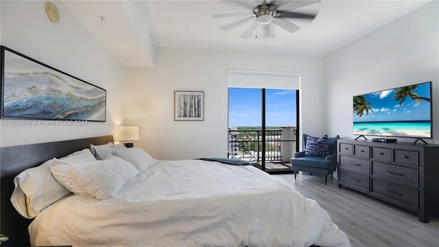 8390 SW 72nd Ave Unit 811, Miami, FL 33143 - bedroom with wood finished floors, access to exterior, and ceiling fan
