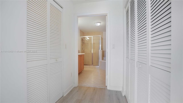 8390 SW 72nd Ave Unit 811, Miami, FL 33143 - corridor with light wood-style floors