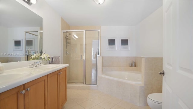 8390 SW 72nd Ave Unit 811, Miami, FL 33143 - bathroom featuring a bath, a stall shower, tile patterned floors, double vanity, and toilet