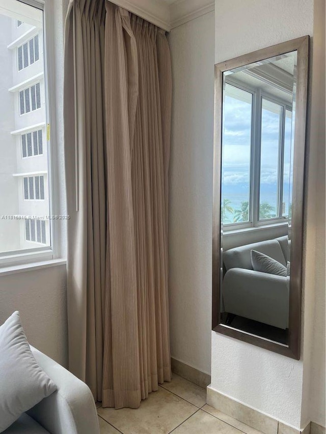 19201 Collins Ave Unit 303, Sunny Isles Beach, FL 33160 - bedroom with light tile patterned floors and baseboards