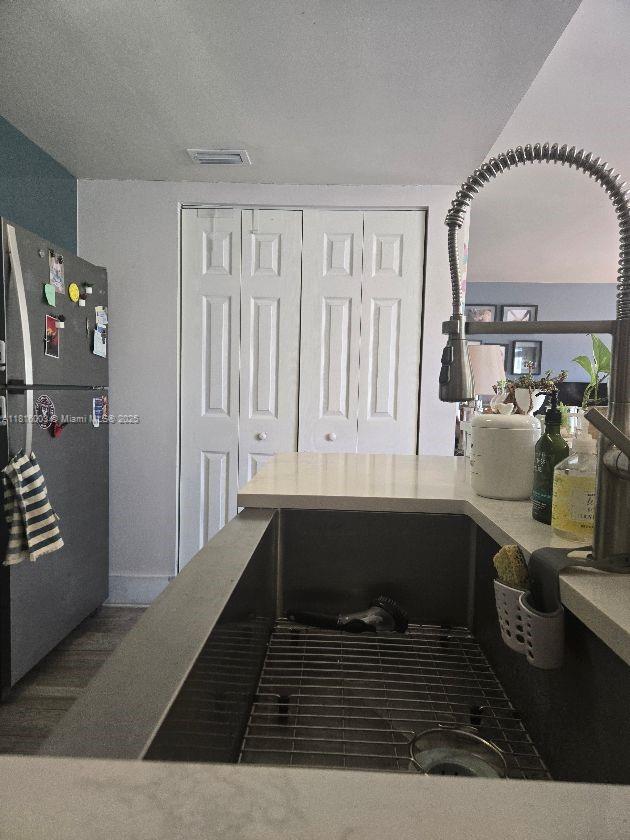 4560 SW 68th Ct Cir Unit 61-9, Miami, FL 33155 - kitchen featuring freestanding refrigerator