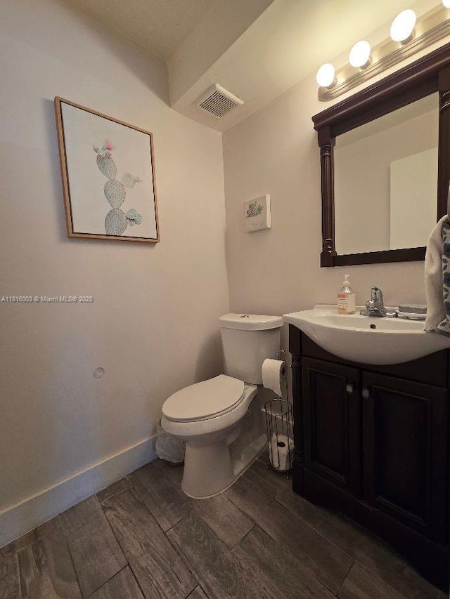 4560 SW 68th Ct Cir Unit 61-9, Miami, FL 33155 - half bathroom featuring wood finished floors and vanity
