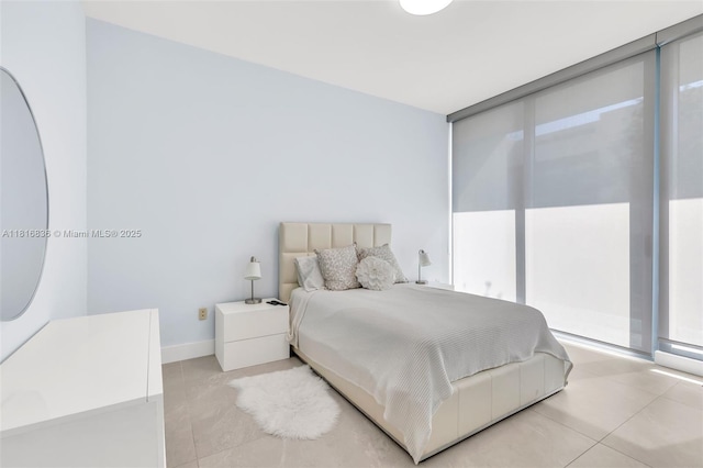 650 NE 32nd St Unit Bh4, Miami, FL 33137 - bedroom with light tile patterned flooring