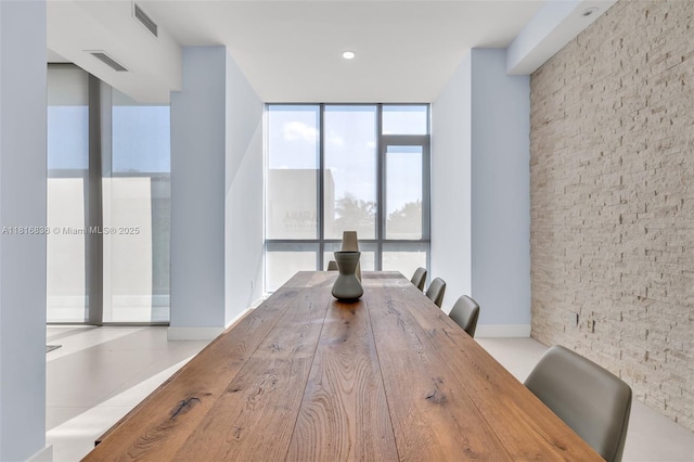 650 NE 32nd St Unit Bh4, Miami, FL 33137 - dining room with expansive windows
