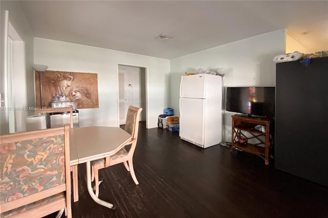 1109 S M St, Lake Worth, FL 33460 - dining space featuring dark wood-type flooring