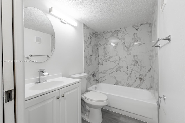 2094 Arbour Walk Unit 318, Naples, FL 34109 - bathroom featuring a textured ceiling, vanity, toilet, bathtub / shower combination, and wood finished floors