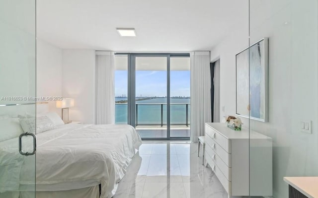 3131 NE 7th Ave Unit 1702, Miami, FL 33137 - bedroom with access to exterior, floor to ceiling windows, light marble finish floors, and a water view