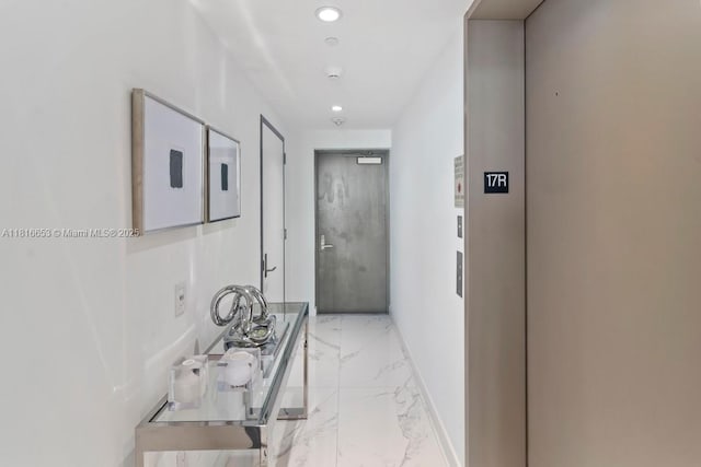3131 NE 7th Ave Unit 1702, Miami, FL 33137 - hall with elevator, light marble finish flooring, and recessed lighting