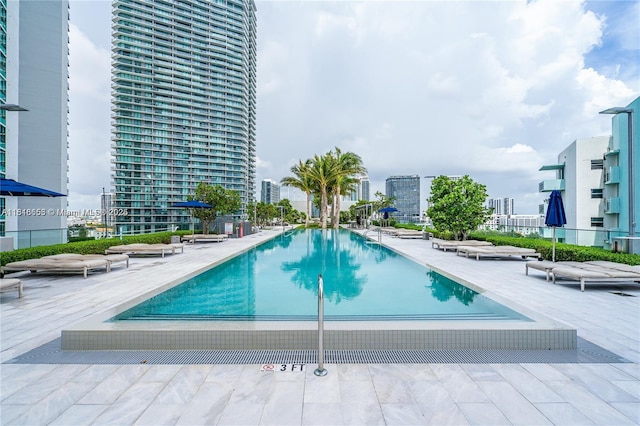 3131 NE 7th Ave Unit 1702, Miami, FL 33137 - community pool featuring a patio and a view of city