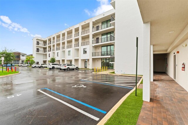 8001 NW 41st St Unit F-107, Doral, FL 33166 - view of property's community with uncovered parking