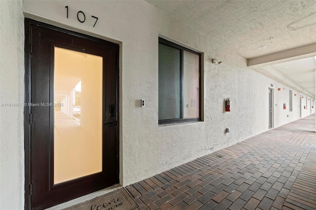 8001 NW 41st St Unit F-107, Doral, FL 33166 - entrance to property featuring stucco siding