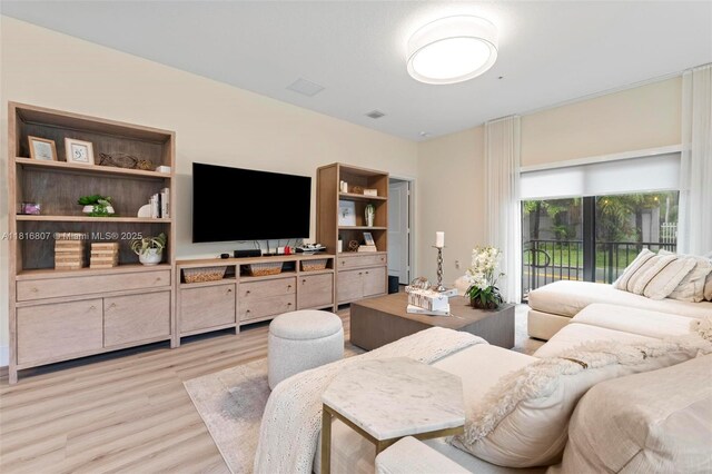 8001 NW 41st St Unit F-107, Doral, FL 33166 - living area with light wood-style floors