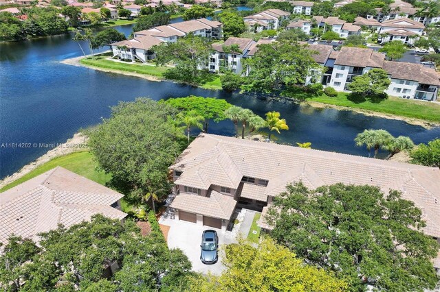 2388 NW 97th Way, Pembroke Pines, FL 33024 - aerial perspective of suburban area with a large body of water