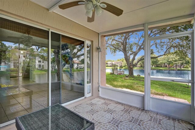 2388 NW 97th Way, Pembroke Pines, FL 33024 - unfurnished sunroom featuring a water view and ceiling fan