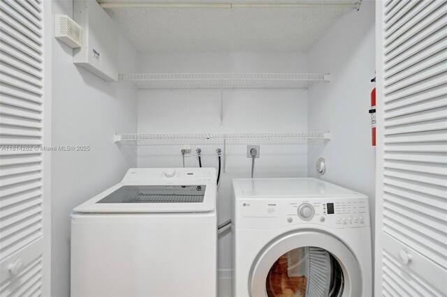 2388 NW 97th Way, Pembroke Pines, FL 33024 - laundry room featuring washing machine and dryer