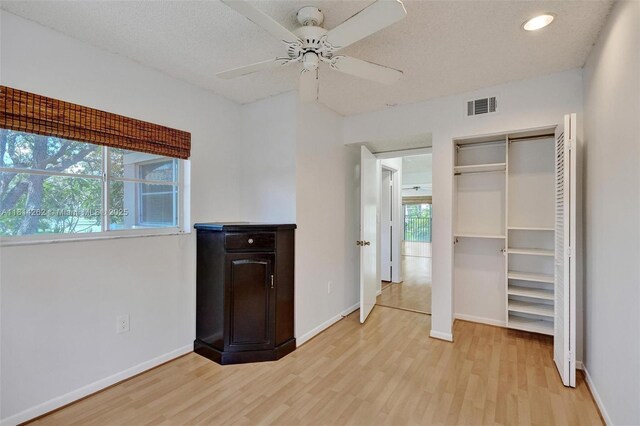 2388 NW 97th Way, Pembroke Pines, FL 33024 - unfurnished bedroom with light wood-type flooring, a closet, a ceiling fan, and recessed lighting