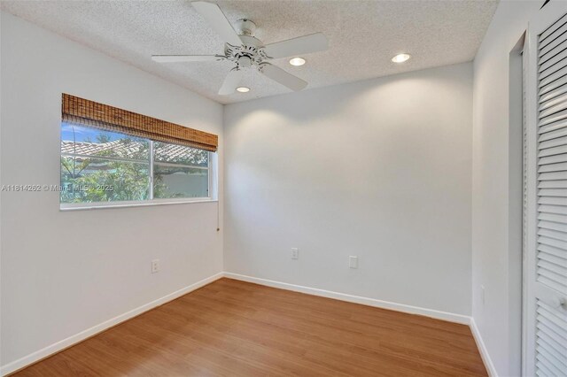 2388 NW 97th Way, Pembroke Pines, FL 33024 - unfurnished room featuring light wood-type flooring, recessed lighting, a textured ceiling, and a ceiling fan