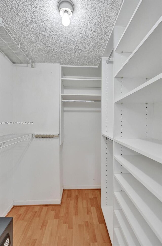 2388 NW 97th Way, Pembroke Pines, FL 33024 - spacious closet with light wood-style floors