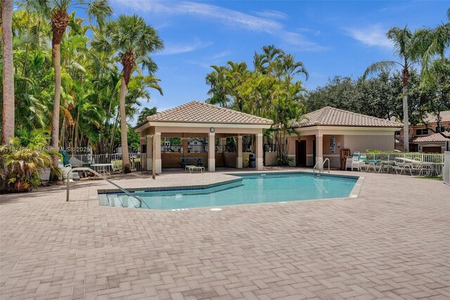 2388 NW 97th Way, Pembroke Pines, FL 33024 - community pool with a gazebo and a patio area