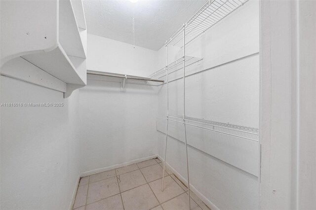 6359 SW 1st St, Margate, FL 33068 - spacious closet featuring light tile patterned flooring