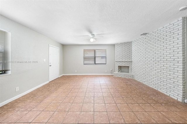6359 SW 1st St, Margate, FL 33068 - unfurnished living room featuring a ceiling fan, a brick fireplace, a textured ceiling, light tile patterned floors, and brick wall