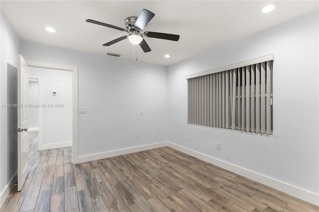 1023 N F St, Lake Worth, FL 33460 - empty room with a ceiling fan, wood finished floors, baseboards, and recessed lighting