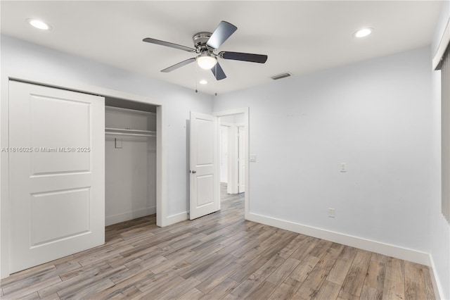 1023 N F St, Lake Worth, FL 33460 - unfurnished bedroom with a closet, light wood finished floors, baseboards, recessed lighting, and a ceiling fan