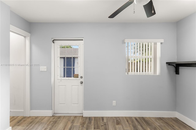 1023 N F St, Lake Worth, FL 33460 - entrance foyer with a ceiling fan, baseboards, and wood finished floors