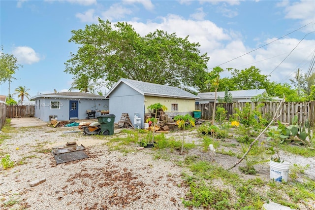 1023 N F St, Lake Worth, FL 33460 - back of house with a fenced backyard