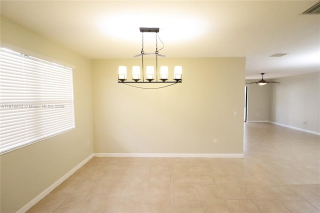 9120 SW 227th Ter, Cutler Bay, FL 33190 - empty room featuring a ceiling fan, a chandelier, and light tile patterned floors