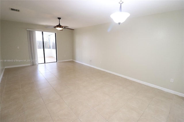 9120 SW 227th Ter, Cutler Bay, FL 33190 - spare room featuring a ceiling fan and baseboards