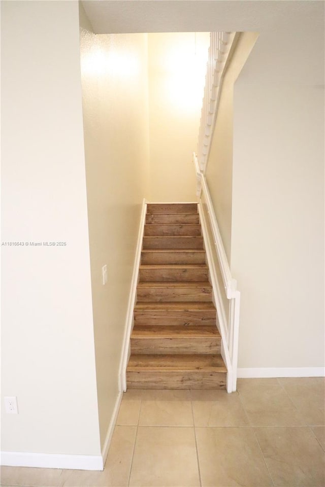 9120 SW 227th Ter, Cutler Bay, FL 33190 - stairs with tile patterned flooring and baseboards