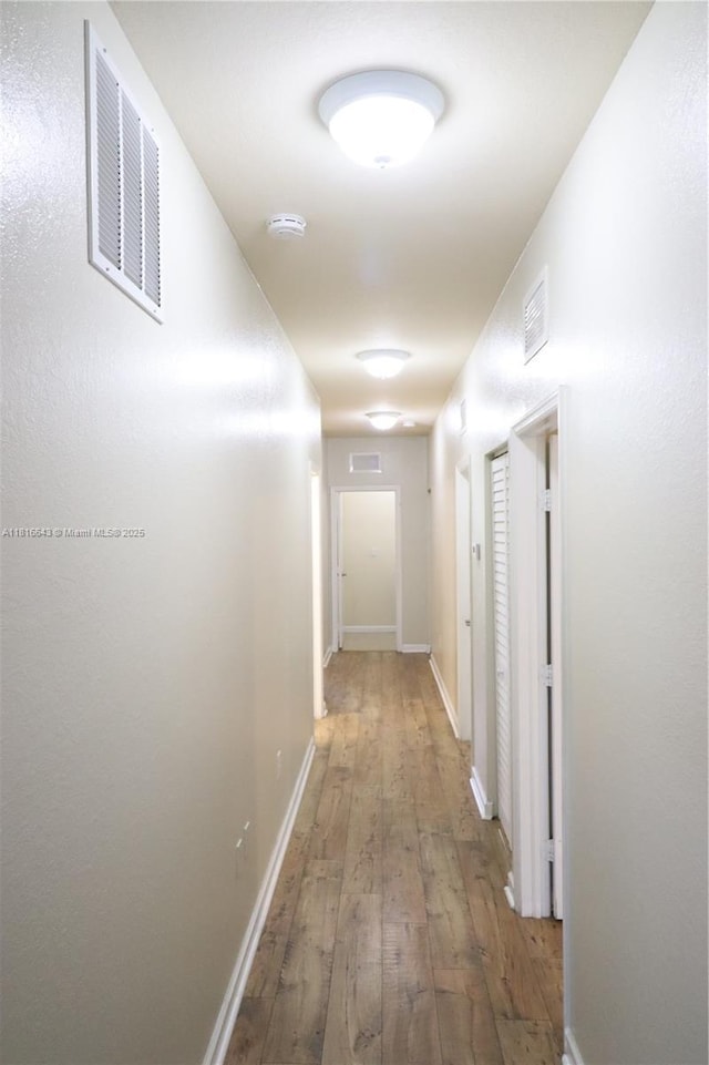 9120 SW 227th Ter, Cutler Bay, FL 33190 - corridor featuring wood-type flooring and baseboards