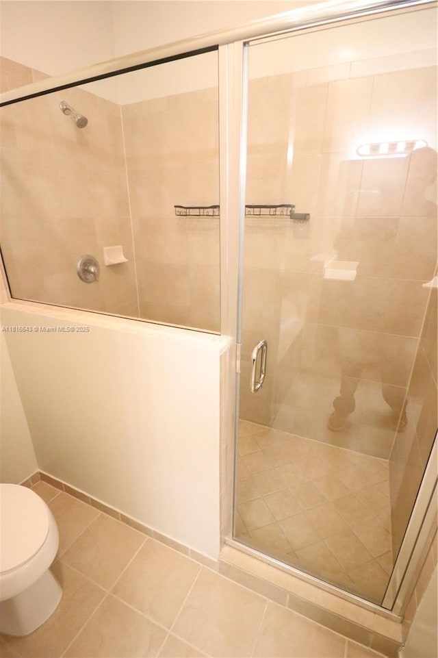 9120 SW 227th Ter, Cutler Bay, FL 33190 - bathroom featuring a shower stall and tile patterned floors