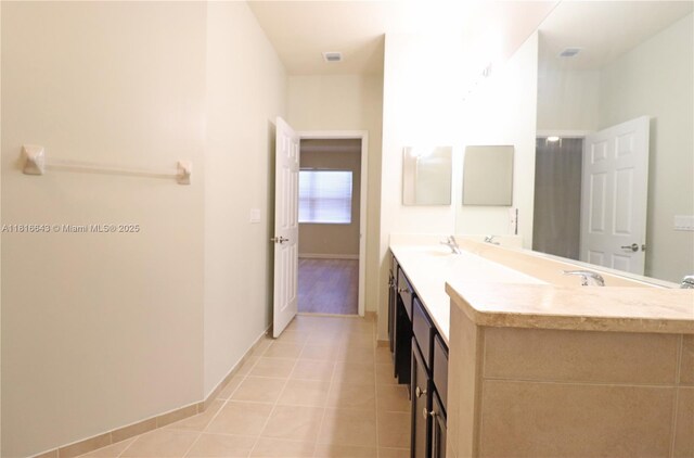 9120 SW 227th Ter, Cutler Bay, FL 33190 - full bathroom featuring double vanity and tile patterned floors