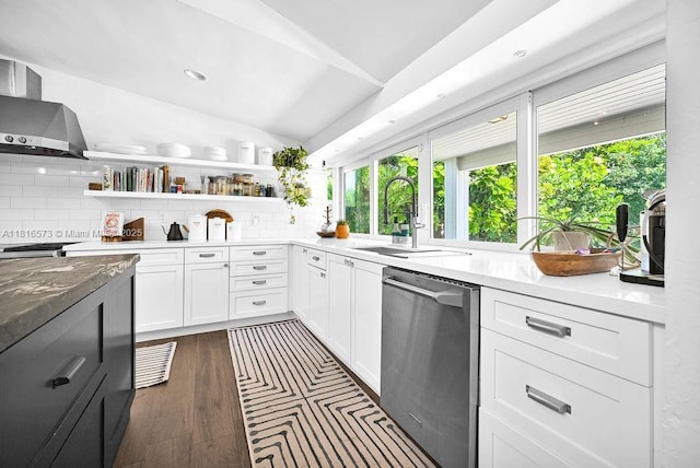 7761 SW 170th St, Palmetto Bay, FL 33157 - kitchen with stainless steel dishwasher, wall chimney range hood, backsplash, open shelves, and lofted ceiling