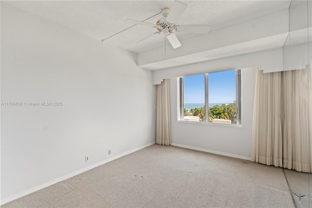 201 Crandon Blvd Unit 633, Key Biscayne, FL 33149 - spare room featuring carpet floors, a textured ceiling, and ceiling fan