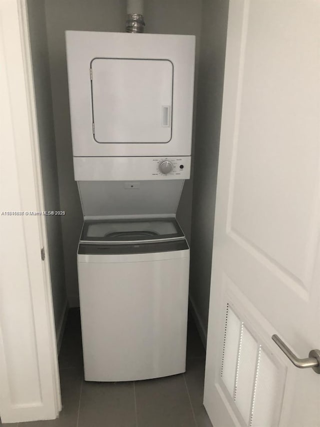1600 NE 1st Ave Unit 3319, Miami, FL 33132 - washroom featuring stacked washer / drying machine and tile patterned floors