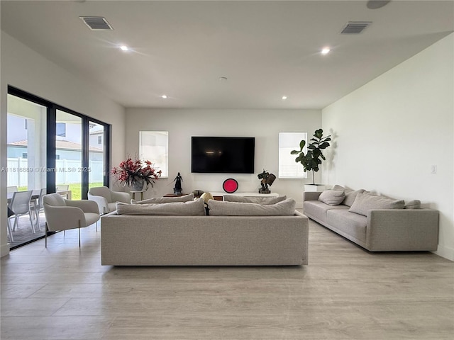 8167 NW 45th St, Doral, FL 33166 - living area with recessed lighting and light wood-type flooring