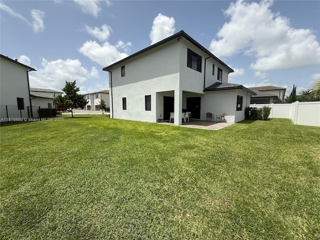 8167 NW 45th St, Doral, FL 33166 - back of property with stucco siding and a patio