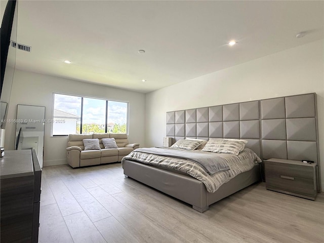 8167 NW 45th St, Doral, FL 33166 - bedroom featuring light wood finished floors, recessed lighting, and baseboards