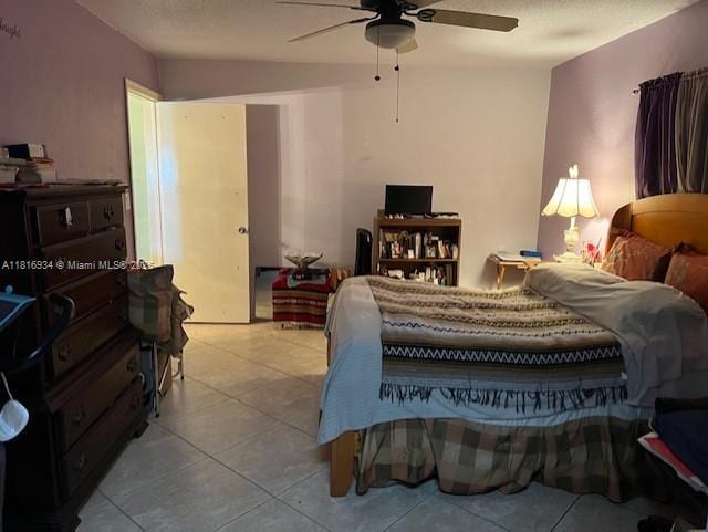 7422 NW 70th Ave, Tamarac, FL 33321 - tiled bedroom with a ceiling fan