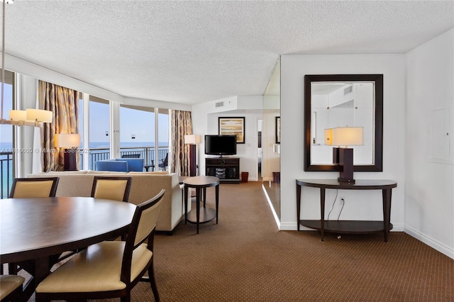 17375 Collins Ave Unit 1908, Sunny Isles Beach, FL 33160 - carpeted dining room with baseboards and a textured ceiling